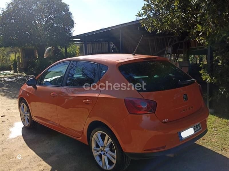 Usado Seat Ibiza 105 CV (77 kW) 2009 Naranja Berlina