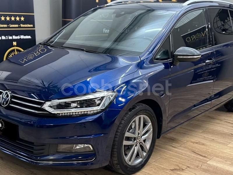 Azul Usado 2021 VW Touran Sportline Monovolumen | 29.900 € (Caro) - Imagen 1/4
