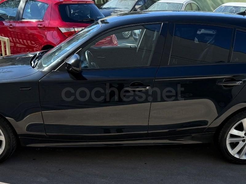 Usado BMW 120 M Sport 170 CV (125 kW) 2010 Negro Utilitario