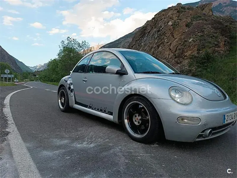 Usado VW New Beetle 100 CV (73 kW) 2002 Gris / plata Utilitario