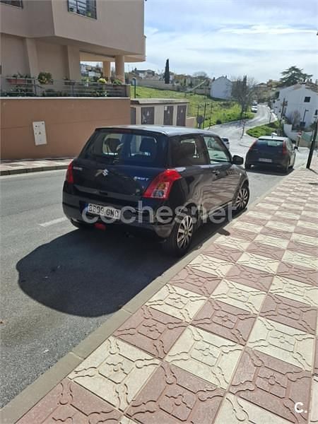 Usado Suzuki Swift GL 92 CV (67 kW) 2009 Negro Utilitario