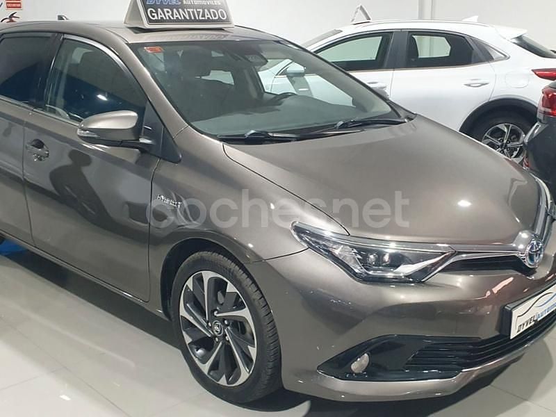 Beige Usado 2016 Toyota Auris Hybrid Advance Berlina | 16.500 € (Precio justo) - Imagen 1/4