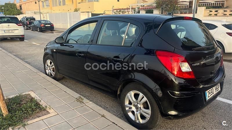 Usado Opel Corsa Selective 75 CV (55 kW) 2013 Negro Berlina