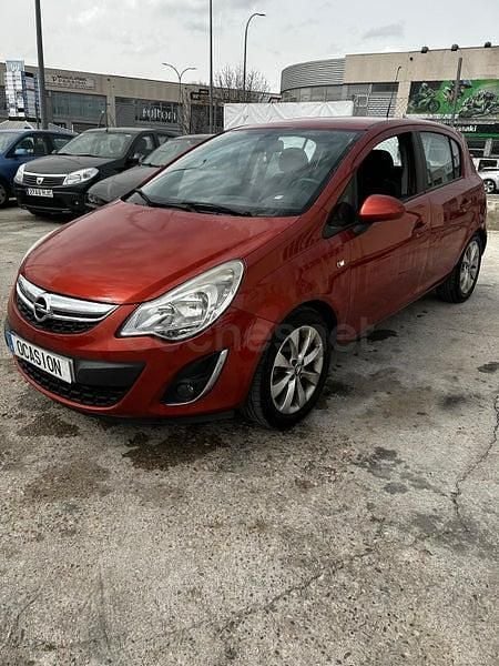 Usado Opel Corsa Expression 75 CV (55 kW) 2012 Rojo Utilitario