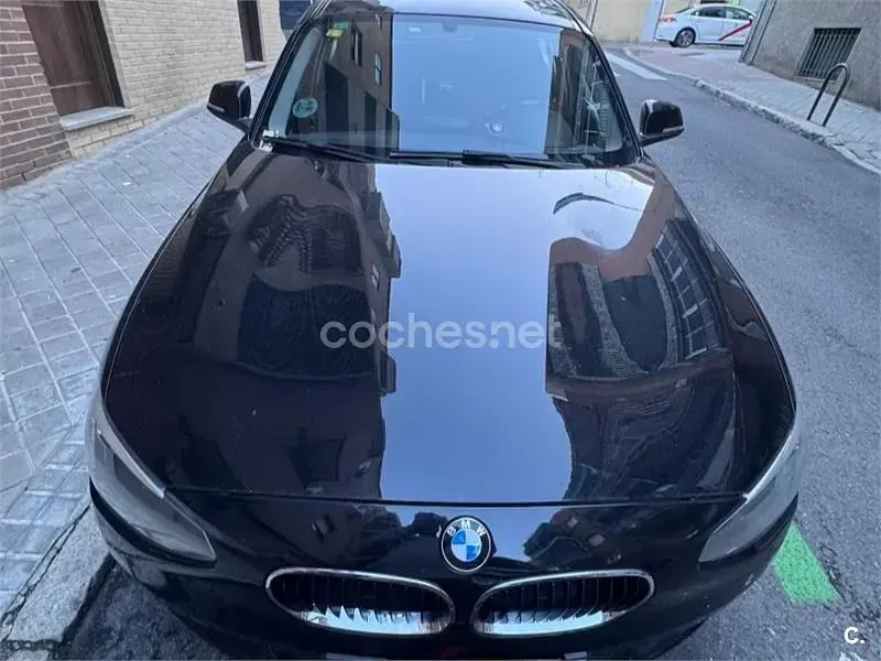 Usado BMW 116 122 CV (89 kW) 2012 Negro Utilitario