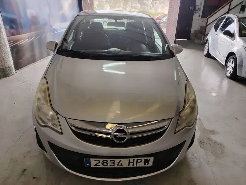 Usado Opel Corsa Selective 95 CV (69 kW) 2013 Gris / plata Utilitario