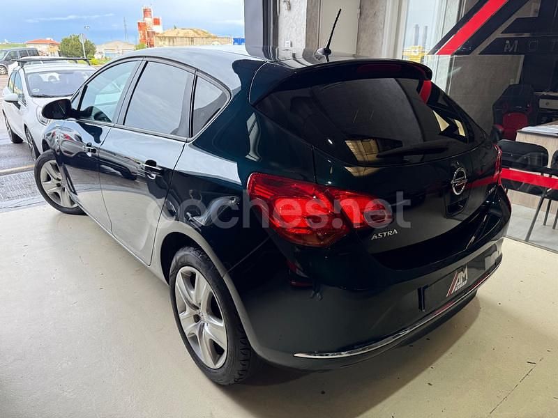 Używany Opel Astra Selective 110 KM (80 kW) 2015 Zielony Sedan/Limuzyna