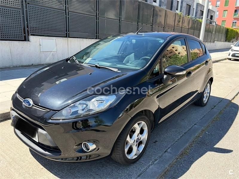 Usado Ford Fiesta Titanium 82 CV (60 kW) 2012 Negro Utilitario
