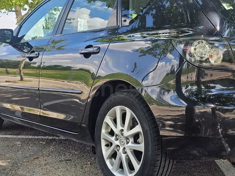Usado Mazda 3 Active 109 CV (80 kW) 2009 Negro Berlina