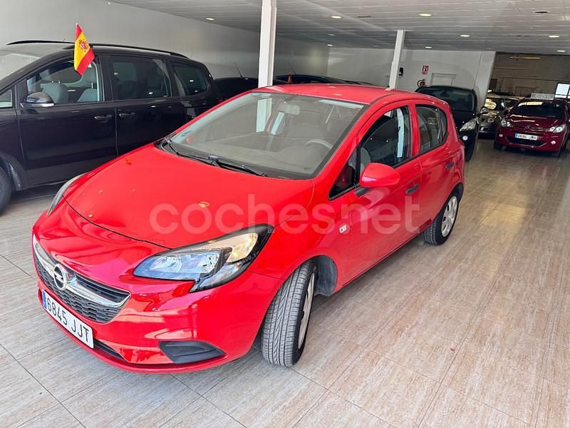 Usado Opel Corsa Selective 75 CV (55 kW) 2015 Granate Utilitario