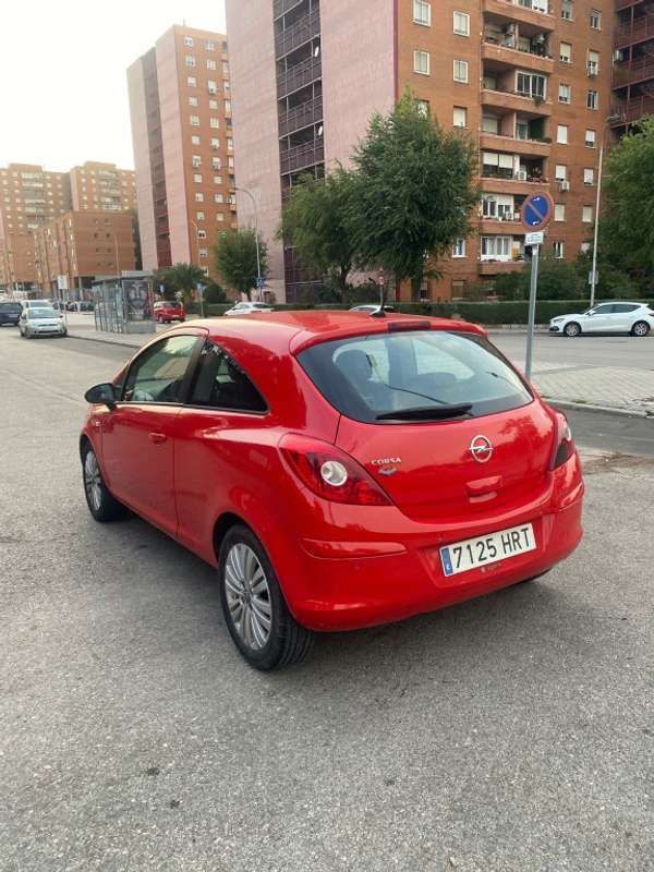 Usado Opel Corsa Selective 86 CV (63 kW) 2014 Rojo Utilitario