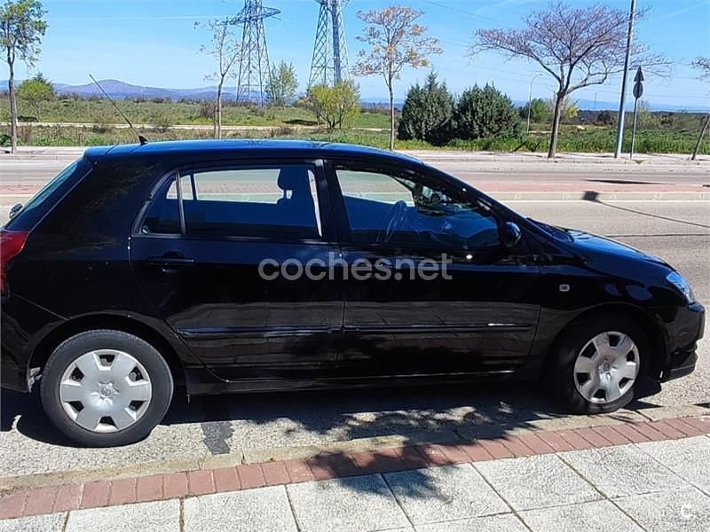 Usado Toyota Corolla Sol 90 CV (66 kW) 2005 Negro Berlina