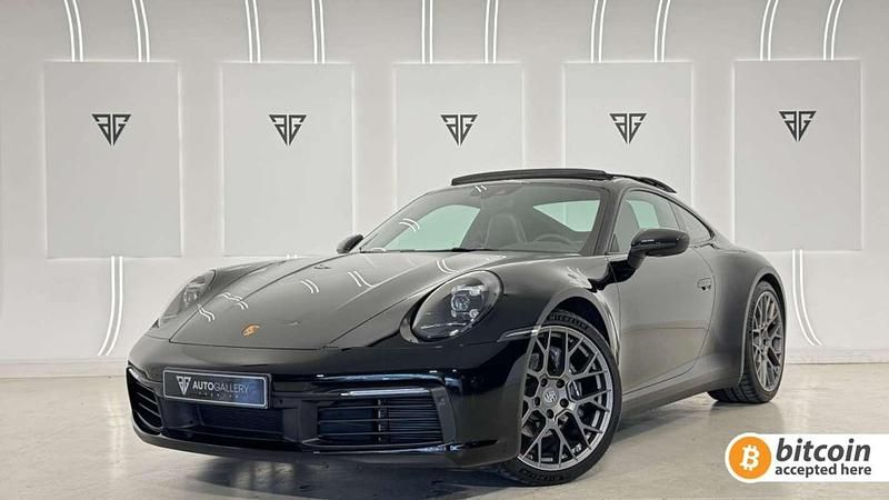 Negro Usado 2024 Porsche 911 Carrera 4 Coupe | 136.900 € - Imagen 1/4