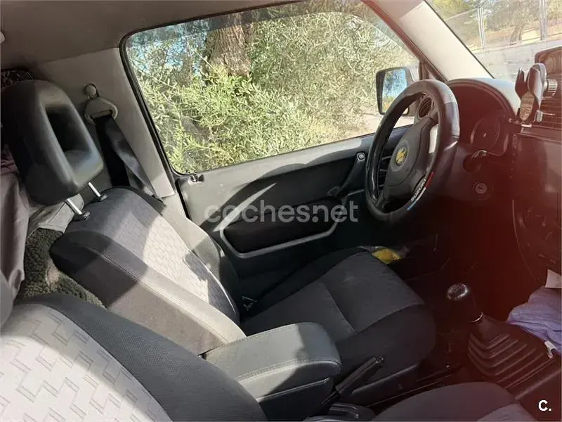 Usado Suzuki Jimny 86 CV (63 kW) 2009 Negro SUV