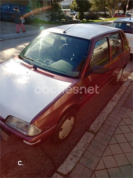 Usado Citroën AX Tonic 58 CV (42 kW) 1996 Granate Utilitario