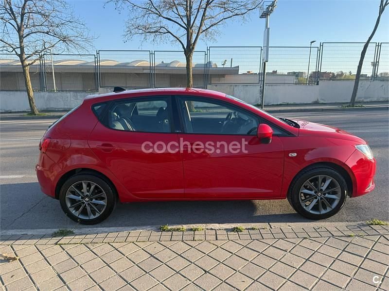 Usado Seat Ibiza I-Tech 85 HP (62 kW) 2014 Vermelho Sedan
