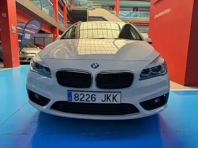 Używany BMW 218 Gran Tourer 150 KM (110 kW) 2015 Biały Minivan