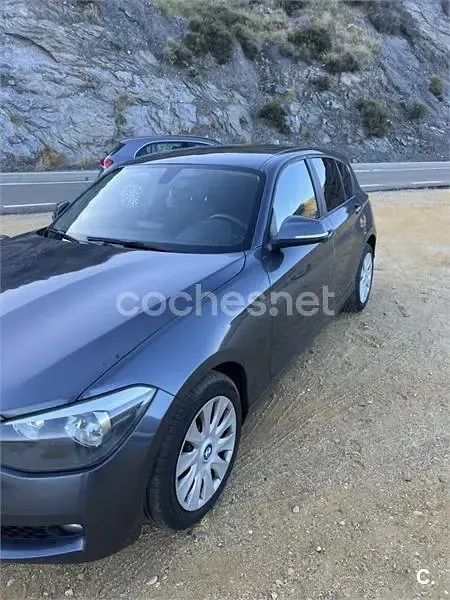 Usado BMW 116 Sport Line 116 CV (85 kW) 2012 Gris / plata Utilitario
