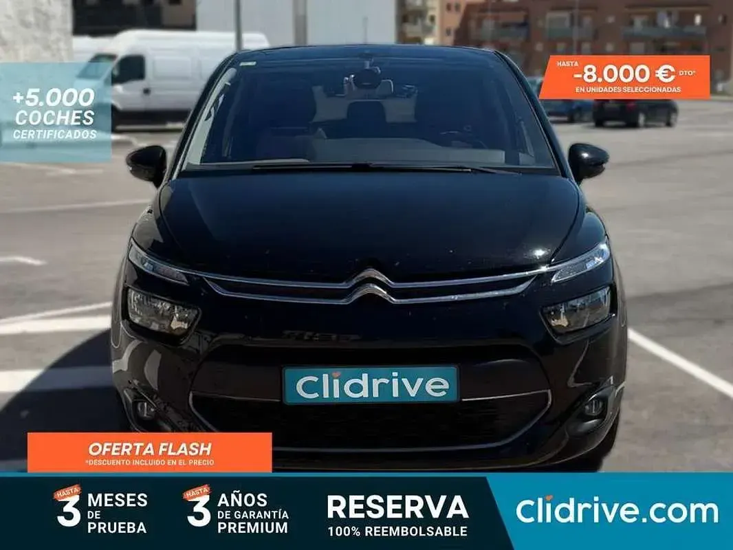 Usado Citroën C4 Exclusive 114 CV (83 kW) 2014 Negro Utilitario
