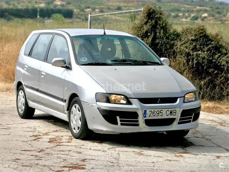 Usado Mitsubishi Space Star 98 CV (72 kW) 2004 Gris / plata Monovolumen