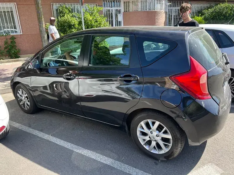 Usado Nissan Note Premium Edition 90 CV (66 kW) 2014 Negro Utilitario