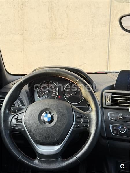 Usado BMW 118 Sport Line 170 CV (125 kW) 2012 Rojo Utilitario