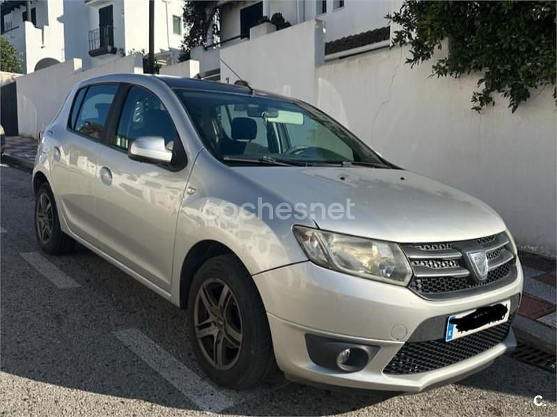 Usado Dacia Sandero Lauréate 90 CV (66 kW) 2012 Blanco Berlina
