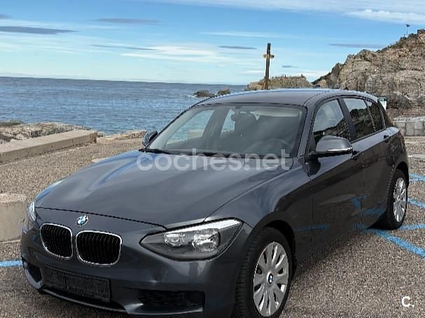 Gris / plata Usado 2013 BMW 116 Comfort Edition Utilitario | 8050 € (Buen precio) - Imagen 1/4