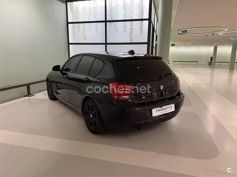 Usado BMW 116 136 CV (100 kW) 2012 Negro Utilitario