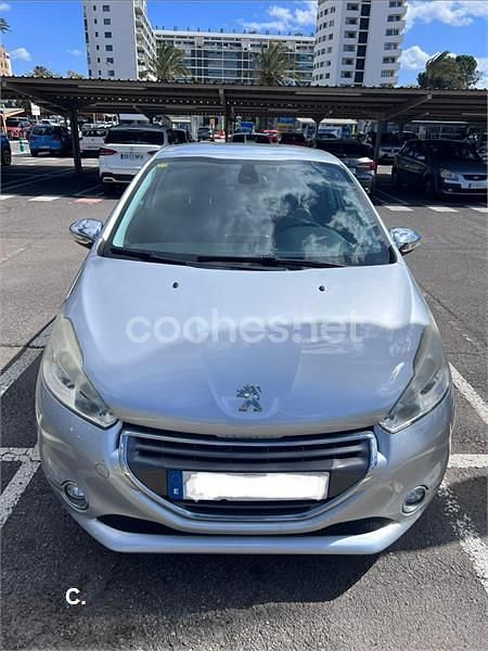 Usado Peugeot 208 Allure 95 CV (69 kW) 2013 Gris / plata Utilitario
