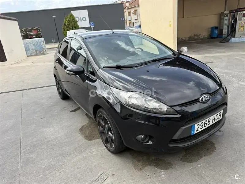 Usado Ford Fiesta Titanium 95 CV (69 kW) 2011 Negro Berlina