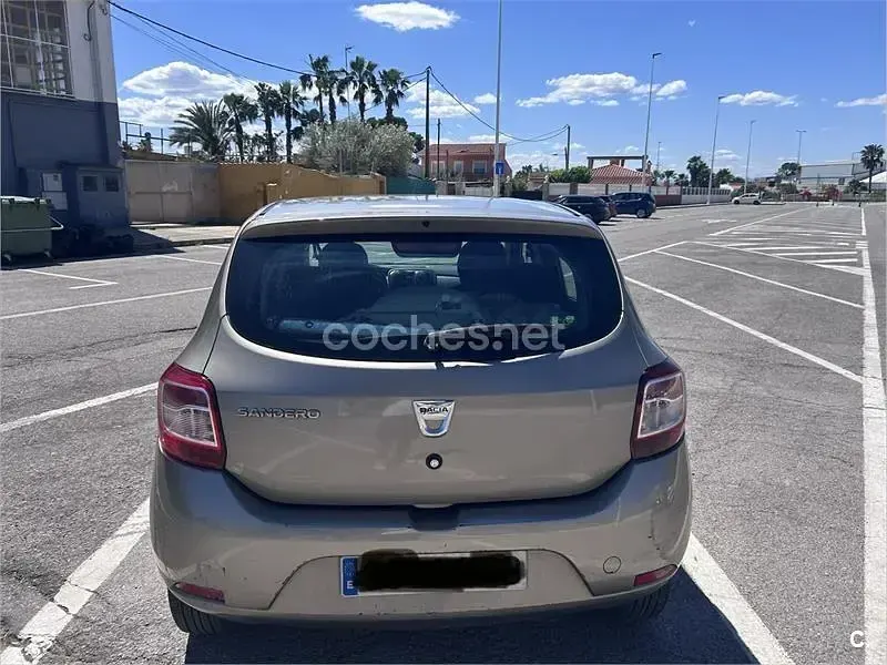Używany Dacia Sandero Ambiance 75 KM (55 kW) 2013 Beżowy Sedan/Limuzyna