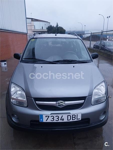 Usado Suzuki Ignis 99 CV (72 kW) 2004 Gris / plata Utilitario