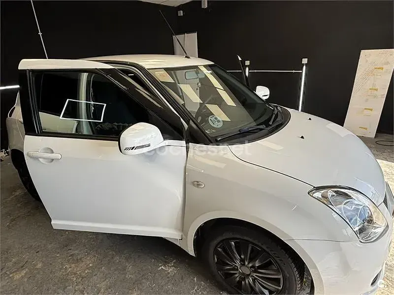 Usado Suzuki Swift GLX 69 CV (50 kW) 2006 Blanco Utilitario