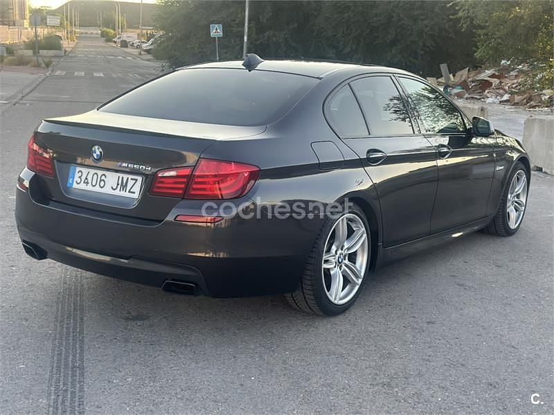 Negro Usado 2012 BMW M550 Comfort Edition Berlina | 21.999 € - Imagen 1/4