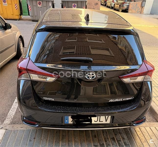 Usado Toyota Auris Hybrid Advance 136 CV (100 kW) 2016 Negro Berlina