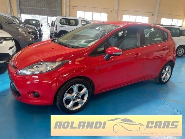 Usado Ford Fiesta Titanium 60 CV (44 kW) 2009 Rojo Utilitario