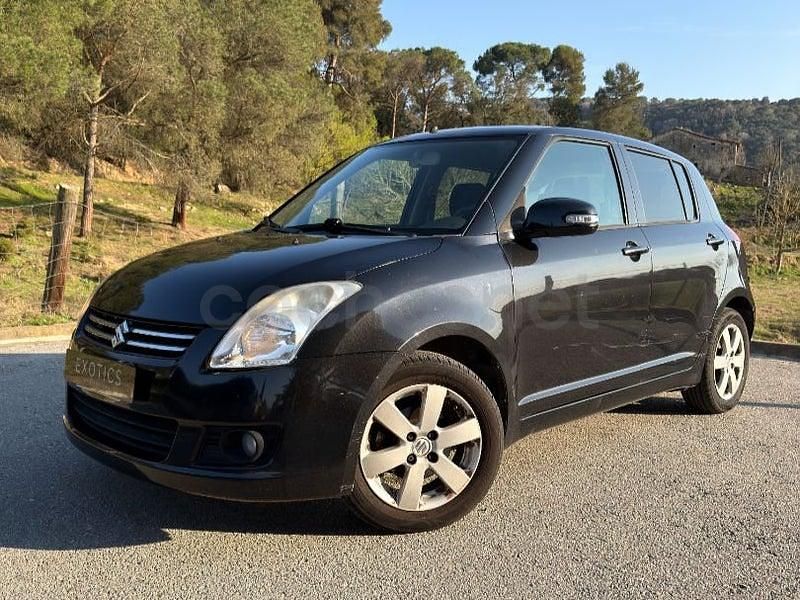 Usado Suzuki Swift 92 CV (67 kW) 2010 Negro Utilitario