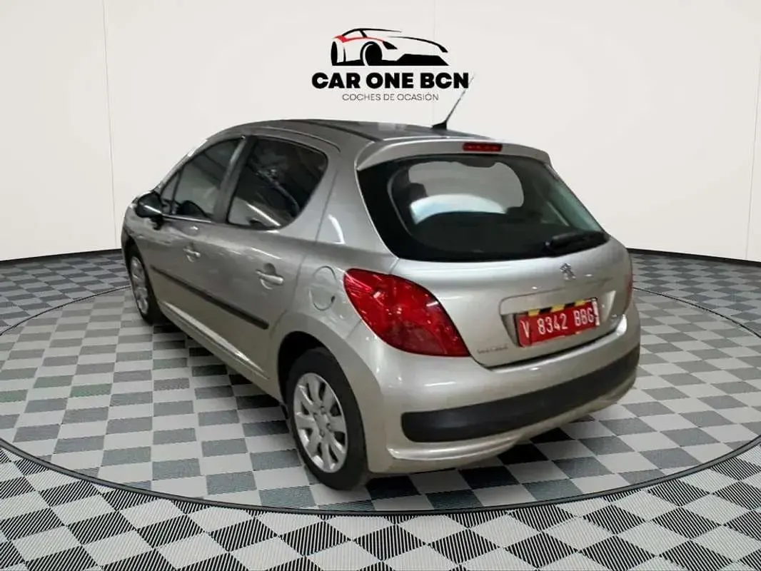 Usado Peugeot 207 69 CV (50 kW) 2009 Gris Utilitario