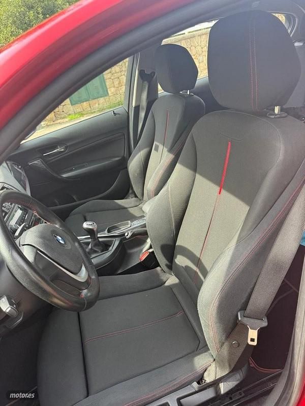 Usado BMW 116 Sport Line 136 CV (100 kW) 2012 Rojo Utilitario