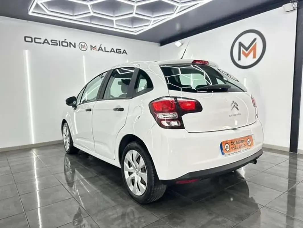 Usado Citroën C3 Attraction 68 CV (50 kW) 2014 Plateado Utilitario