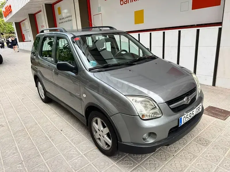 Usado Suzuki Ignis 99 CV (72 kW) 2008 Gris / plata Utilitario