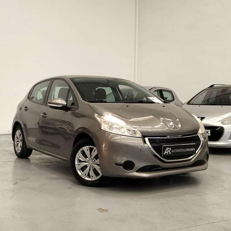 Marrón Usado 2013 Peugeot 208 Access Utilitario | 5599 € (Precio justo) - Imagen 1/4
