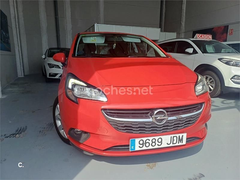 Usado Opel Corsa Expression 75 HP (55 kW) 2015 Vermelho Sedan