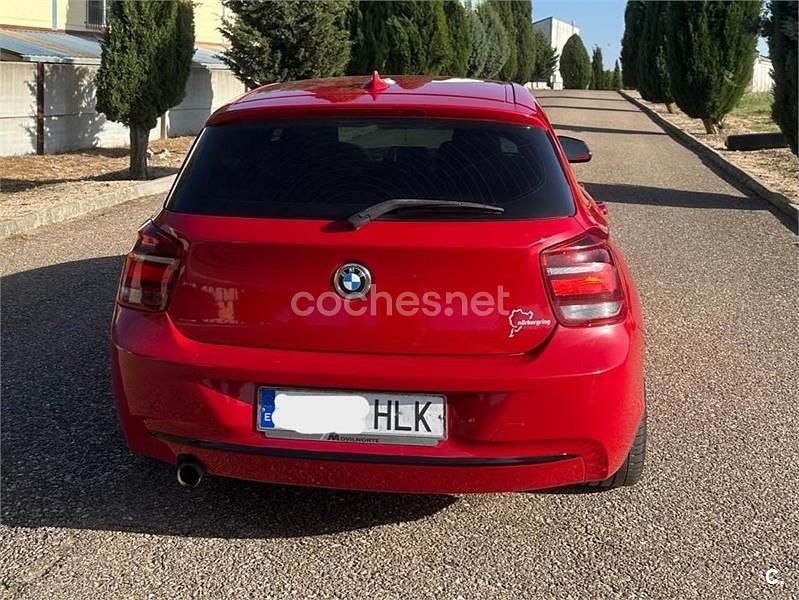 Usado BMW 118 Sport Line 143 CV (105 kW) 2012 Rojo Utilitario