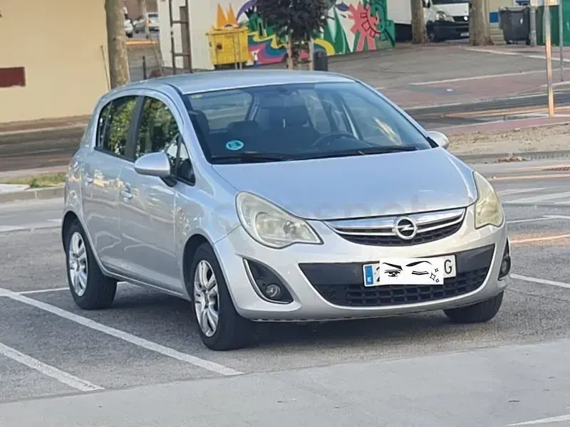 Usado Opel Corsa Selective 85 CV (62 kW) 2012 Gris / plata Utilitario