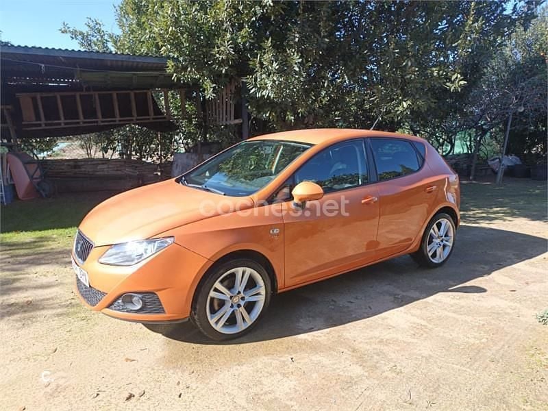 Usado Seat Ibiza 105 CV (77 kW) 2009 Naranja Berlina