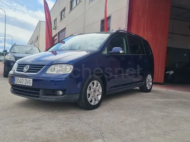 Begagnad VW Touran 105 HK (77 kW) 2006 Blå Minibuss