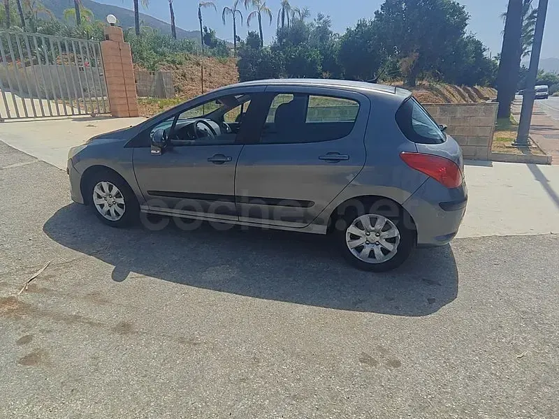 Usado Peugeot 308 110 CV (80 kW) 2010 Gris / plata Berlina