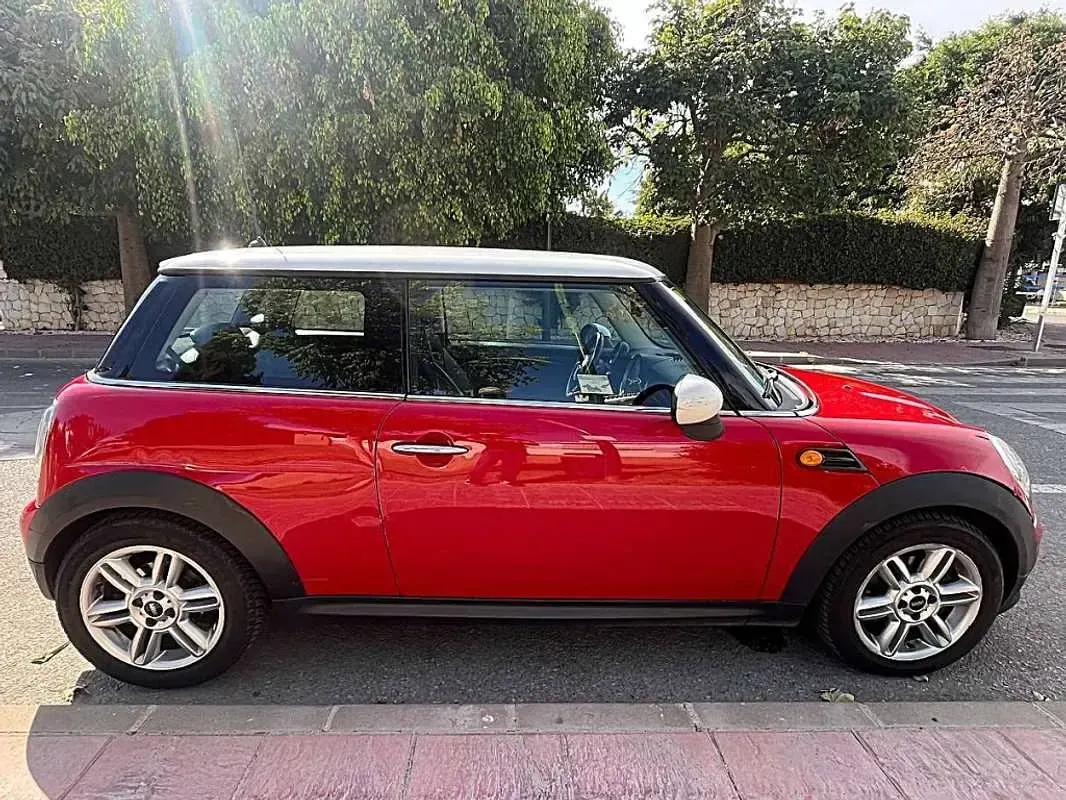 Usado Mini Cooper 122 CV (89 kW) 2012 Rojo Utilitario